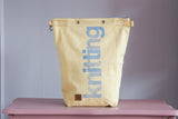 Roll & Stroll Bag - Pastel yellow printed light blue