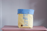 Roll & Stroll Bag - Pastel yellow printed light blue